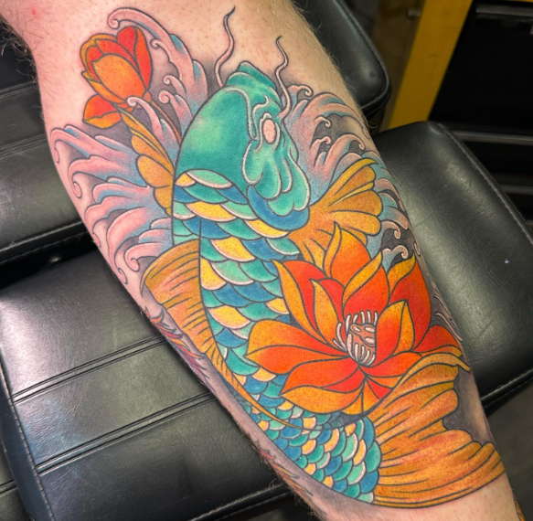 Koi fish with water lily tattoo