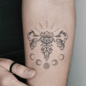 Crescent Moon Womb Tattoo