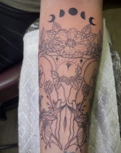 Womb Tattoo On Arm