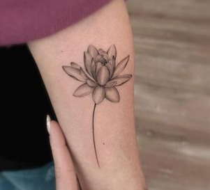 Small water lily tattoo