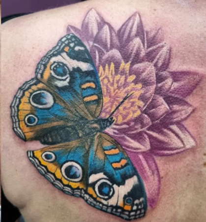 Water lily and butterfly tattoo ideaWater lily and butterfly tattoo ideaWater lily and butterfly tattoo idea