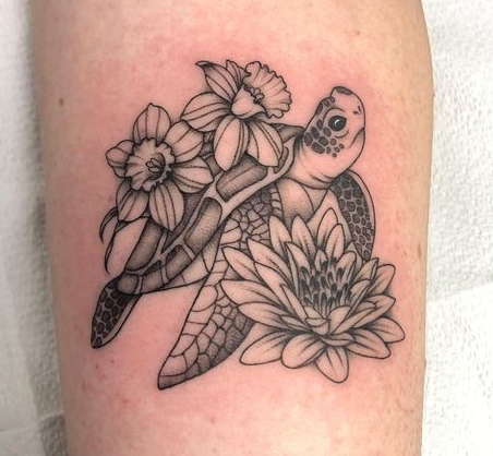 Water lily and turtle tattoo