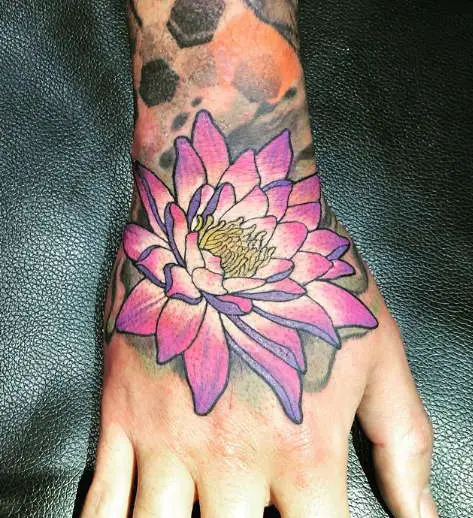 Water lily hand tattoo