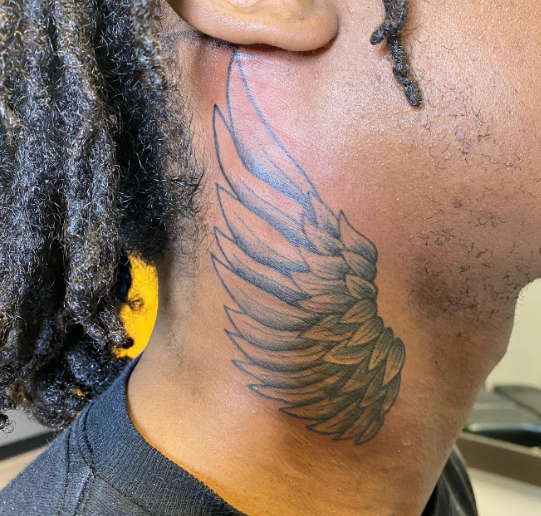 neck tattoos for men wings