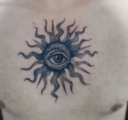sun chest tattoo