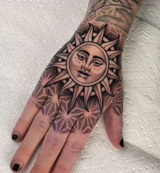sun hand tattoo