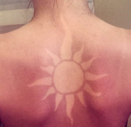 sun tanning tattoo
