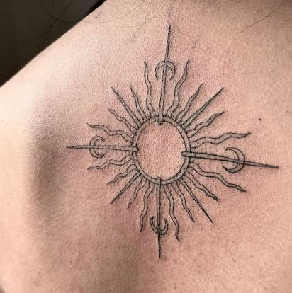 tribal sun tattoo
