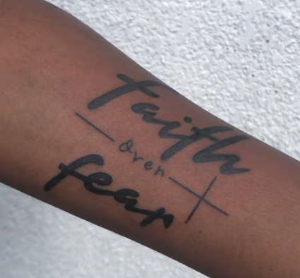 Faith over the fear tattoo with cross