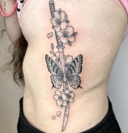 Butterfly Flowers With Knife Tattoo