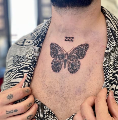 Butterfly Skull Chest Tattoo