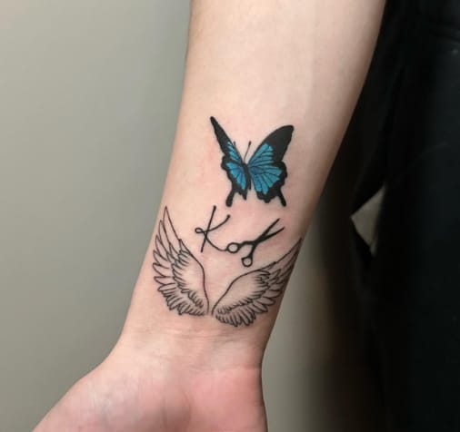 Small Blue Butterfly Tattoo With Angel Wings