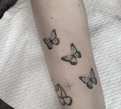 Small Monarch Butterfly Tattoo
